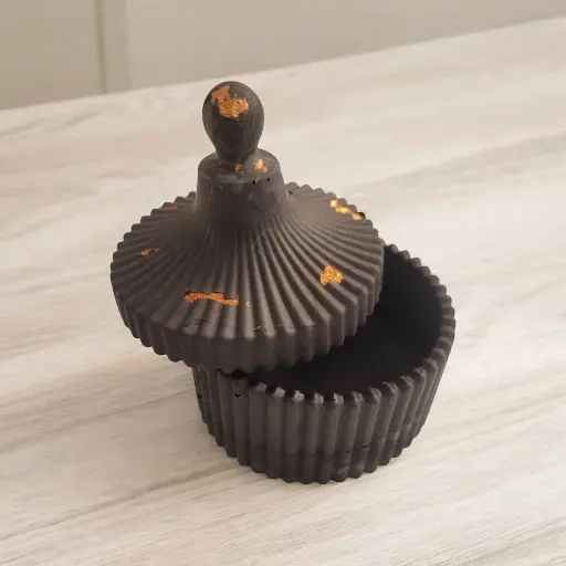 Boîte à bouton